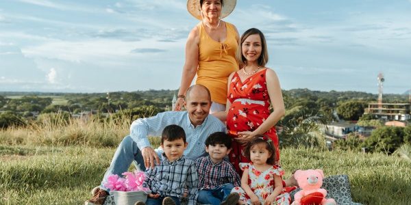 Generational family enjoying a sunny day picnic in La Dorada, Caldas.